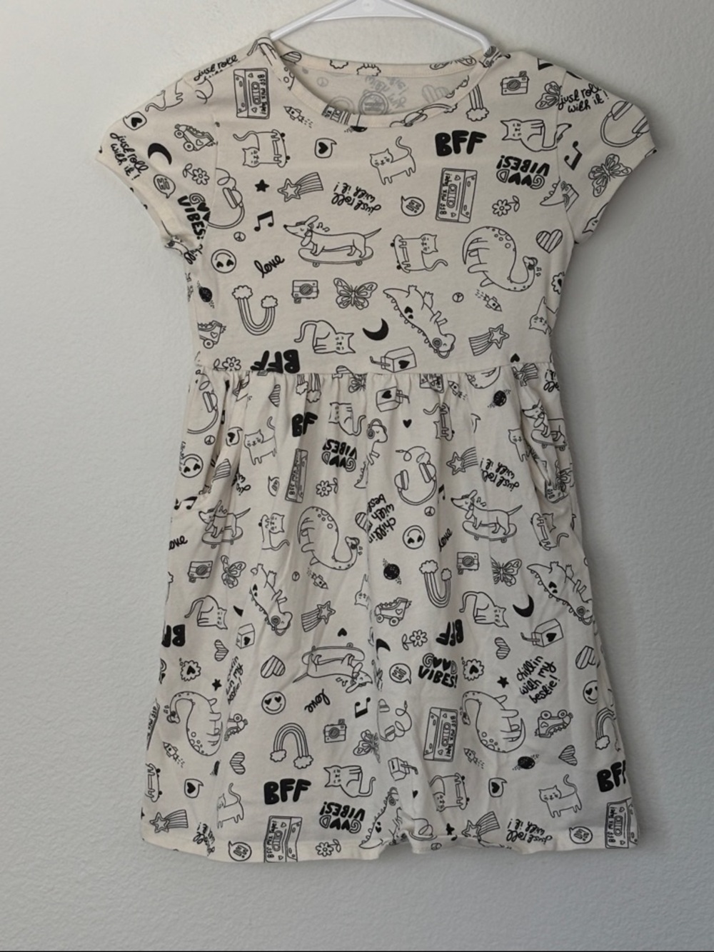 Wonder Nation Cream Dress with Black Doodle Graphics had pockets